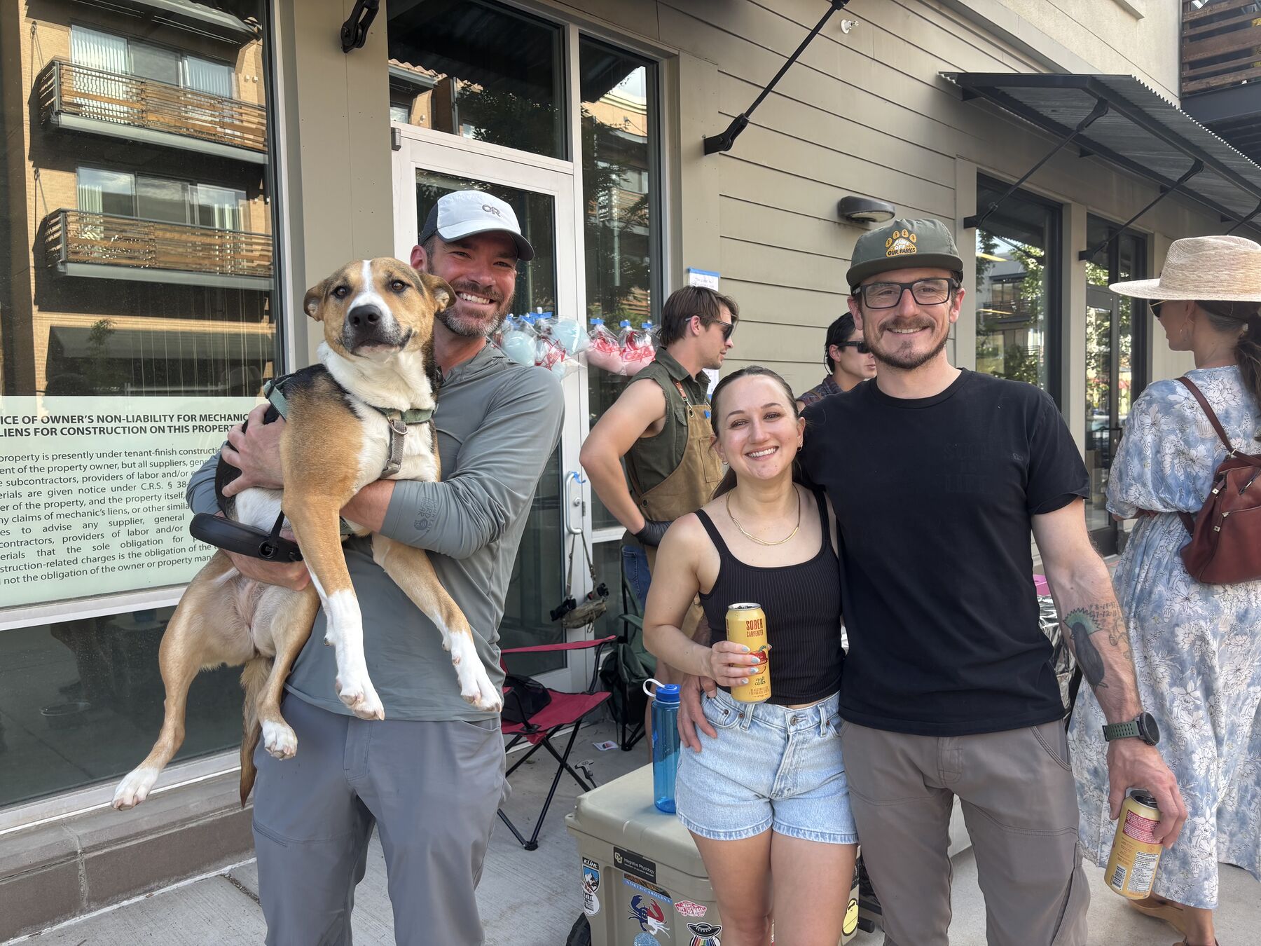 Neighbors with their dog at the block party